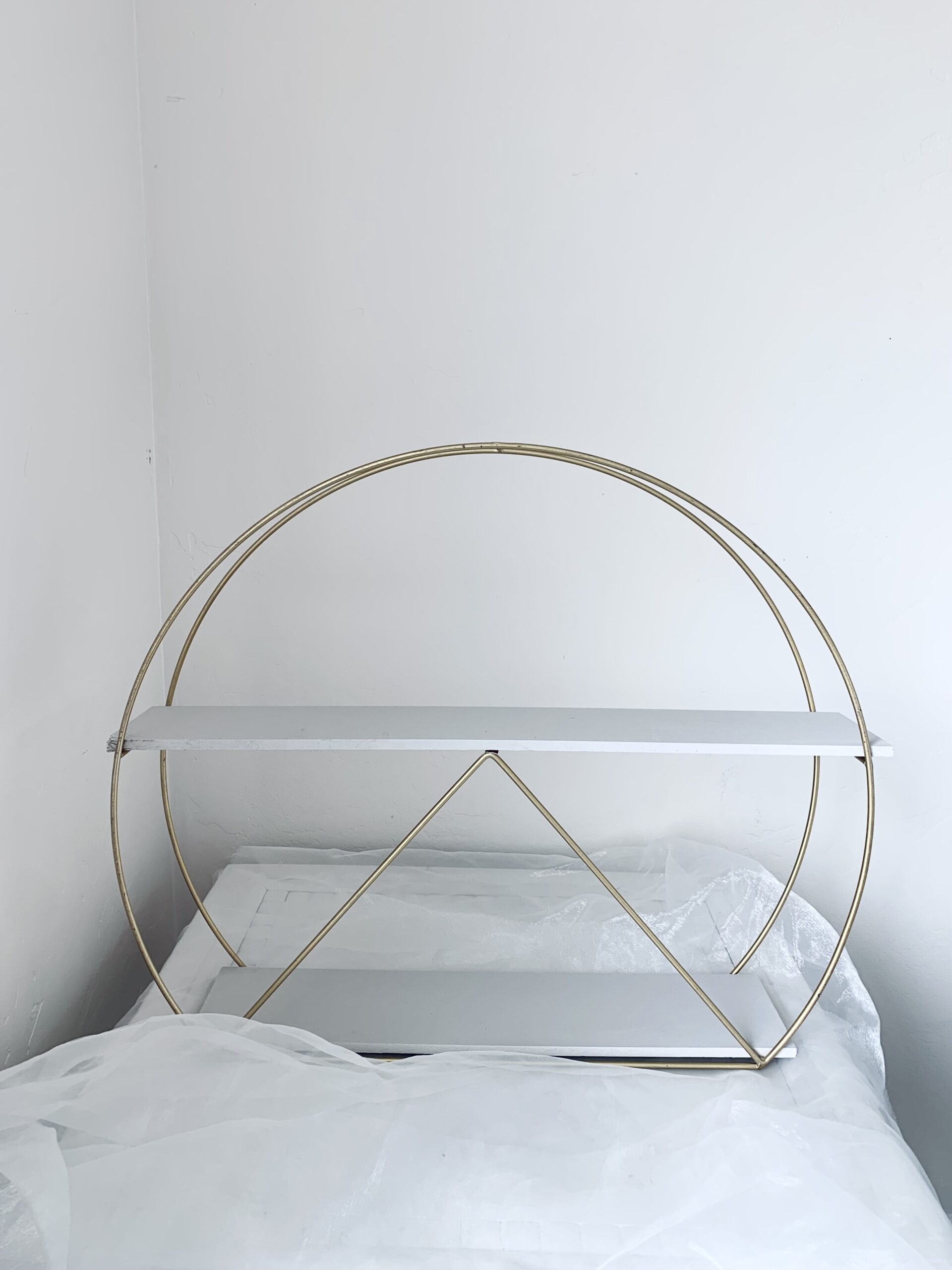 Two-tier gold arch display ideal for up to 36 standard cupcakes/macarons or 72 minis. $25